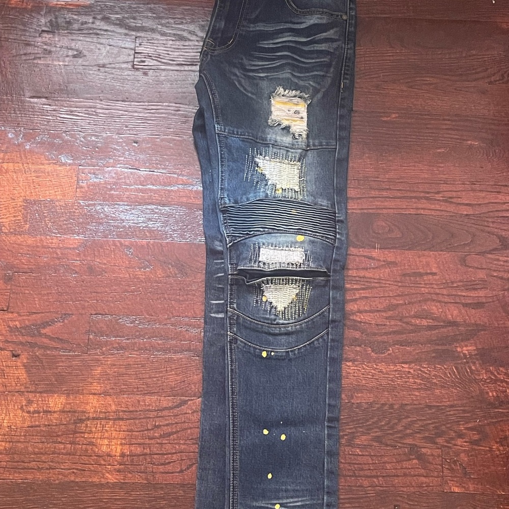 Distressed Blue Denim Jeans
